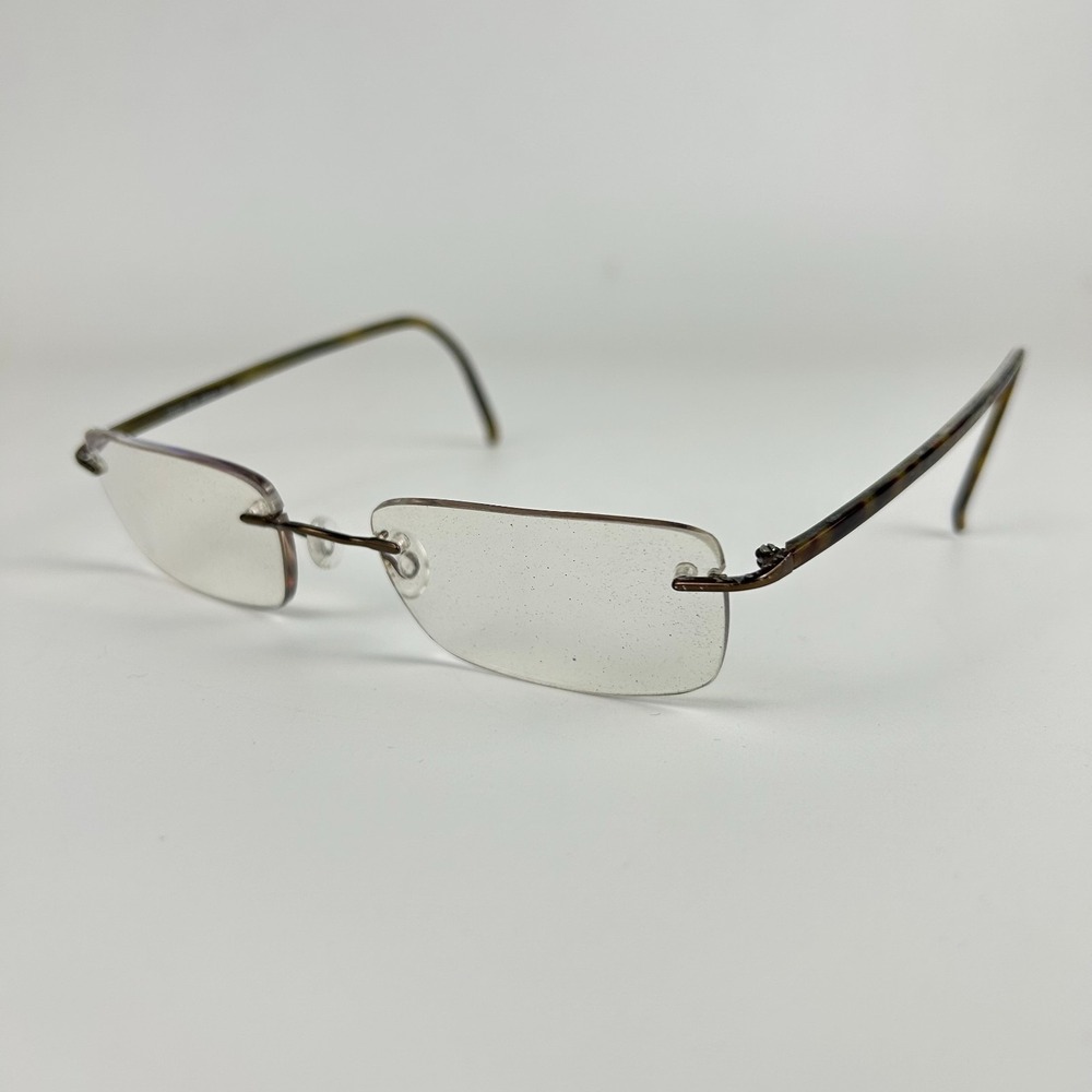 Marchon Airlock2 770/37 014 Unisex Eyeglasses Frame Bronze Rimless 52-21-140‎ mm
